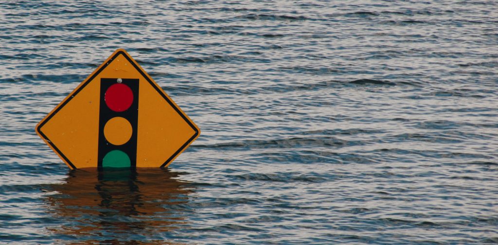 Flooded traffic light warning sign