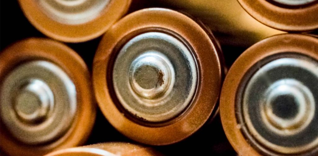 a close-up photo of AA batteries