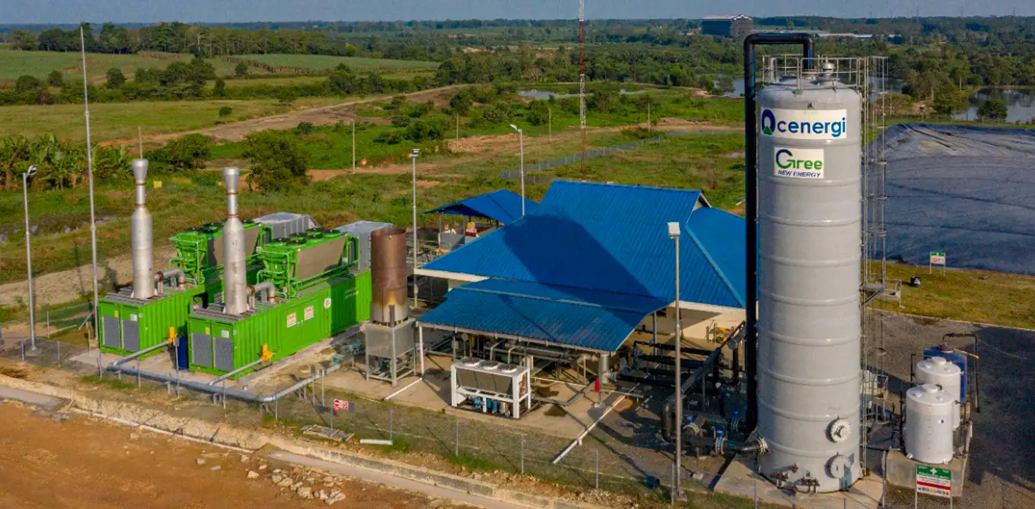 green big containers, blue building, and large tube at Hamparan project site