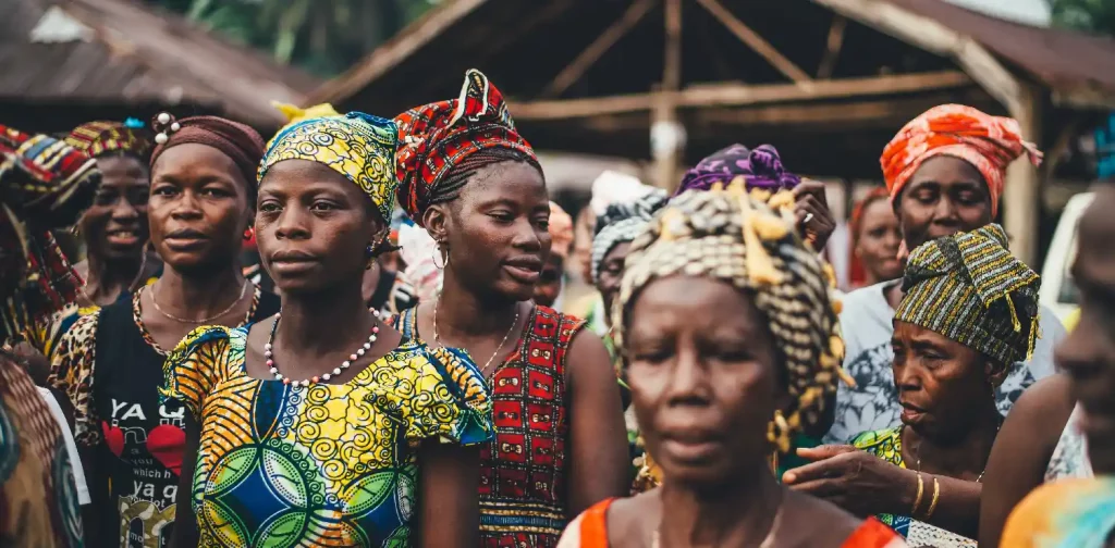 a group of Sierra Leone women wearing traditional attire