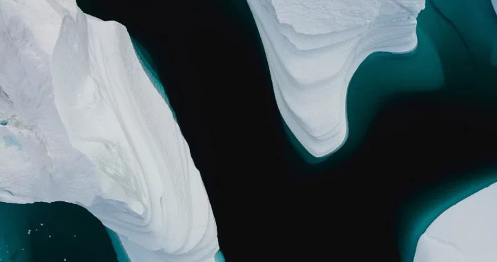 aerial view of melting arctic icebergs
