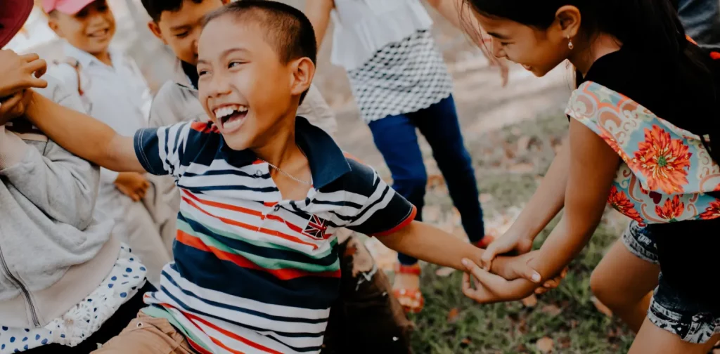 children laughing and playing together