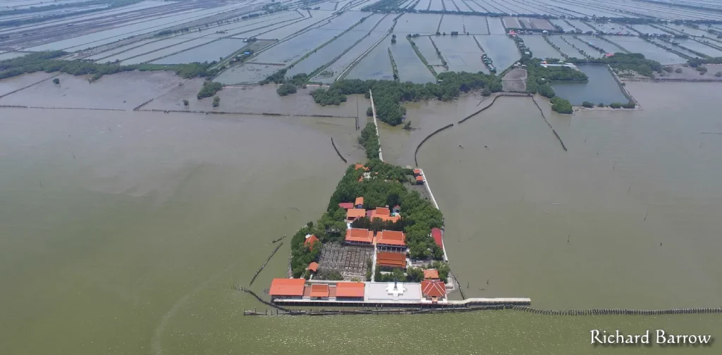 a small sinking village surrounded by water