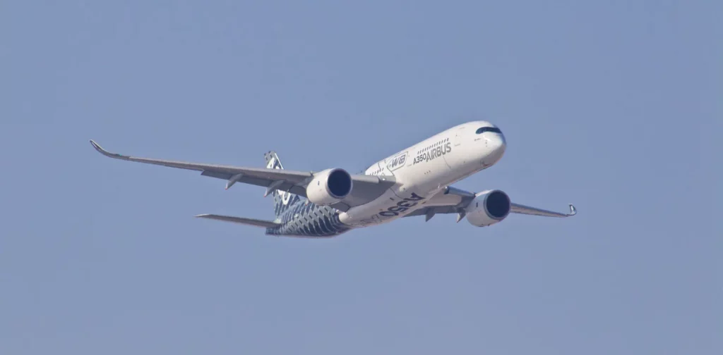 a plane in a blue sky