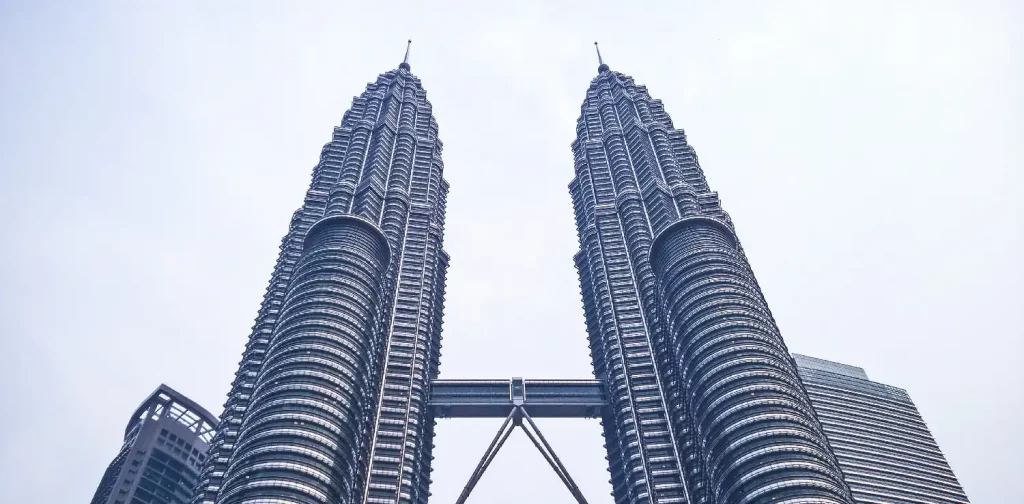 a low-angle photography of Malaysia’s Twin Tower