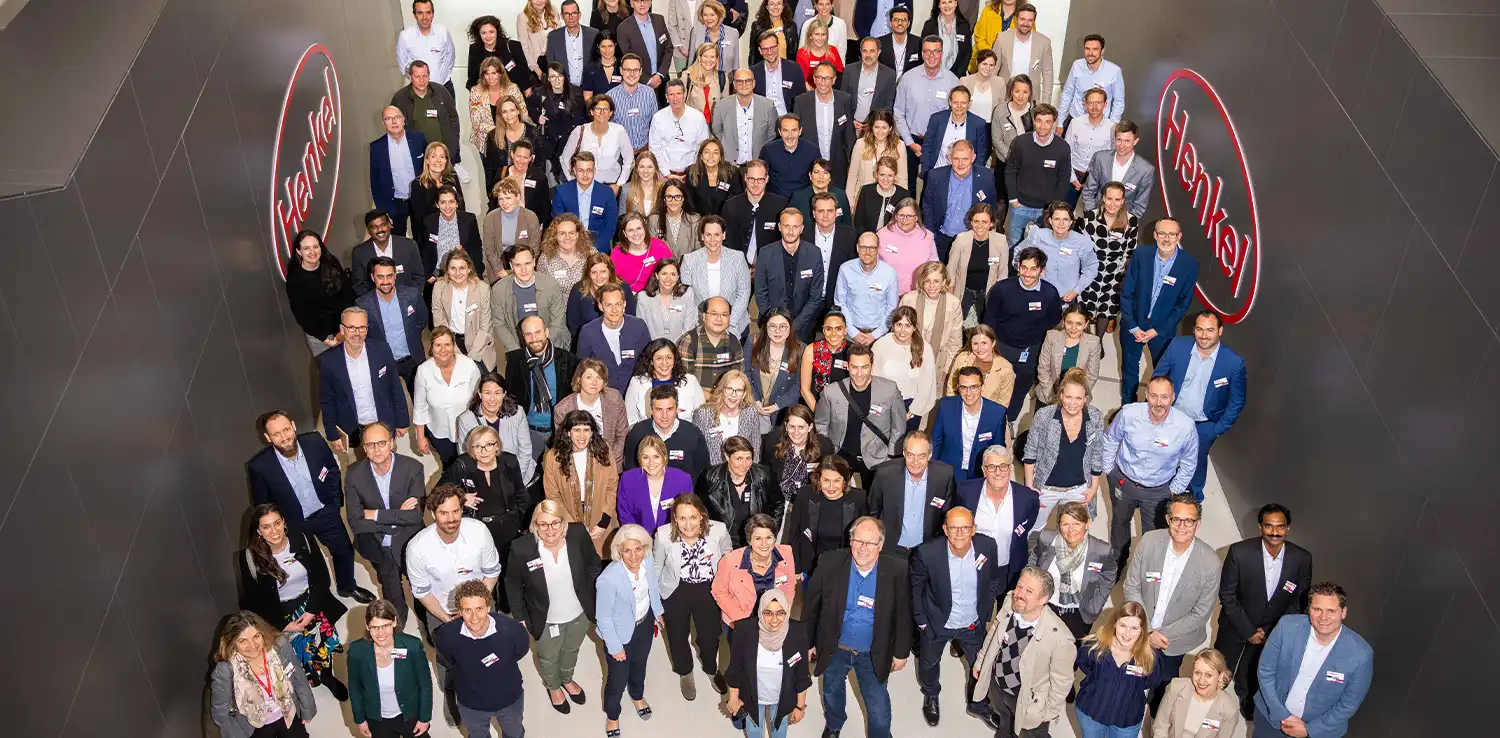 a big group of people looking up at the camera