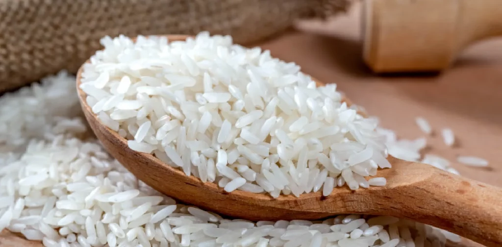 White rice in a wood spoon