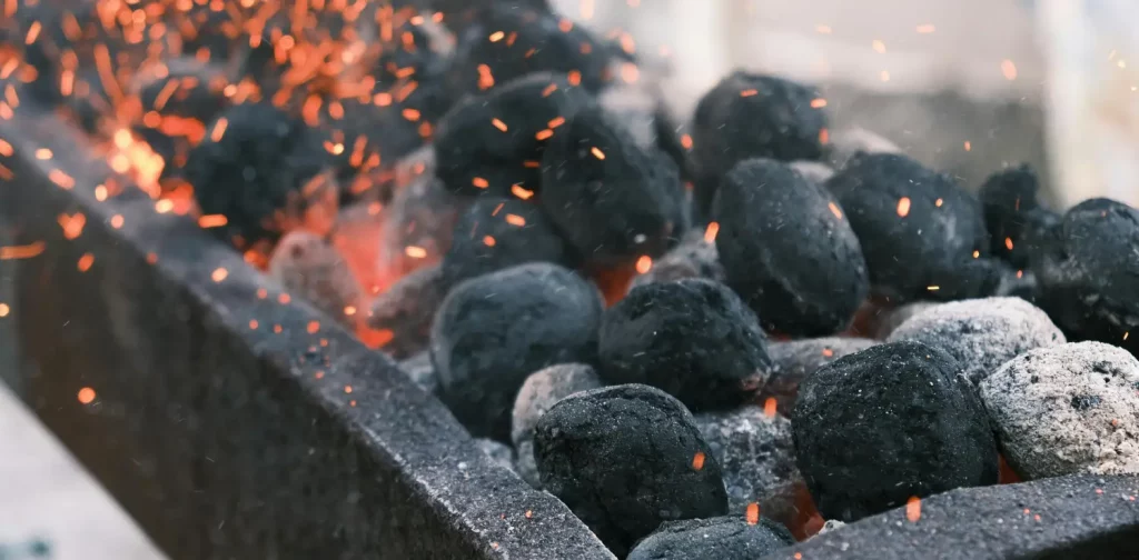 Charcoal burning in a griller