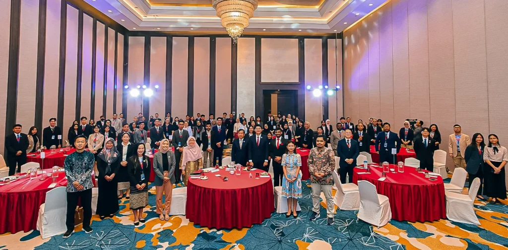 a group of people in a hall