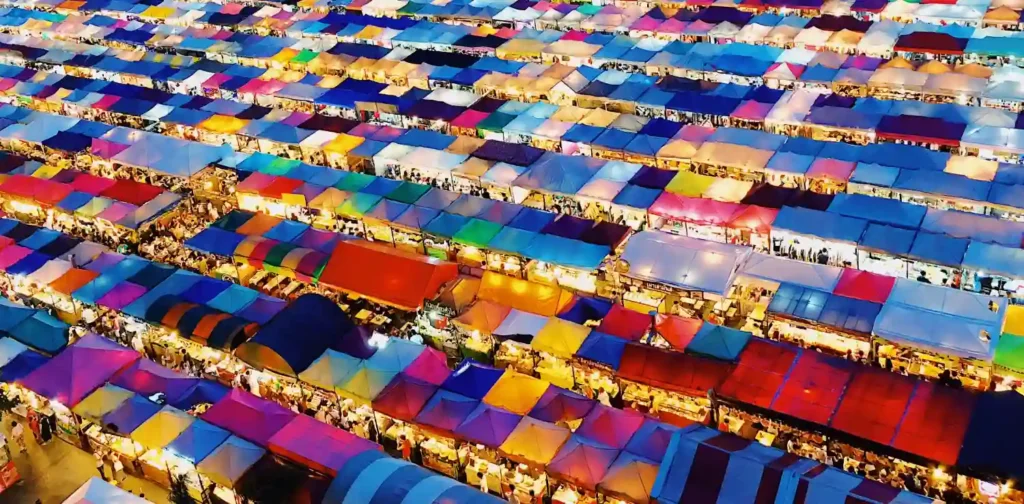 an aerial photo of street market vendors in Thailand market