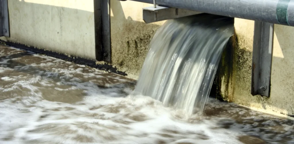 wastewater flowing out of a pipe