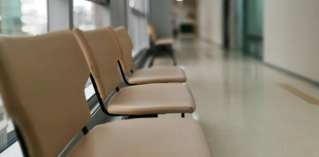 empty seats in a hospital corridor