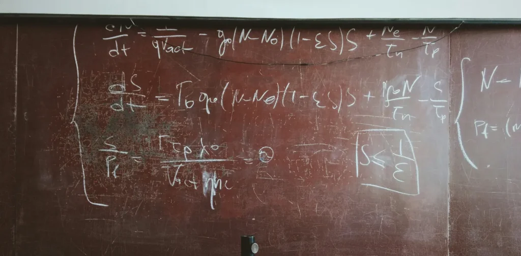 a blackboard with math equations written on it