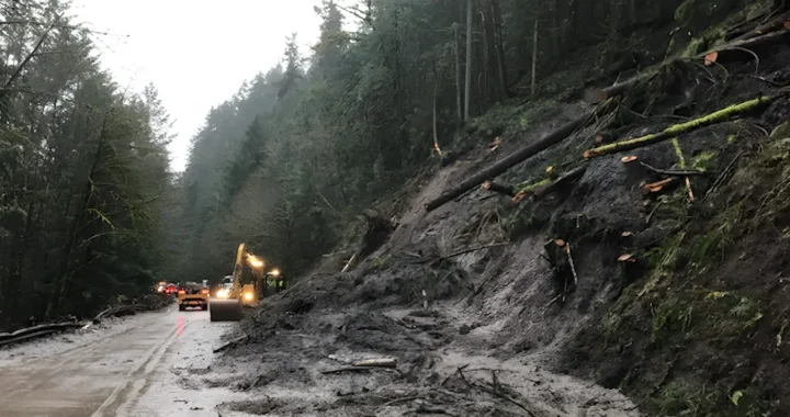heap of soil in the middle of road stopping traffic