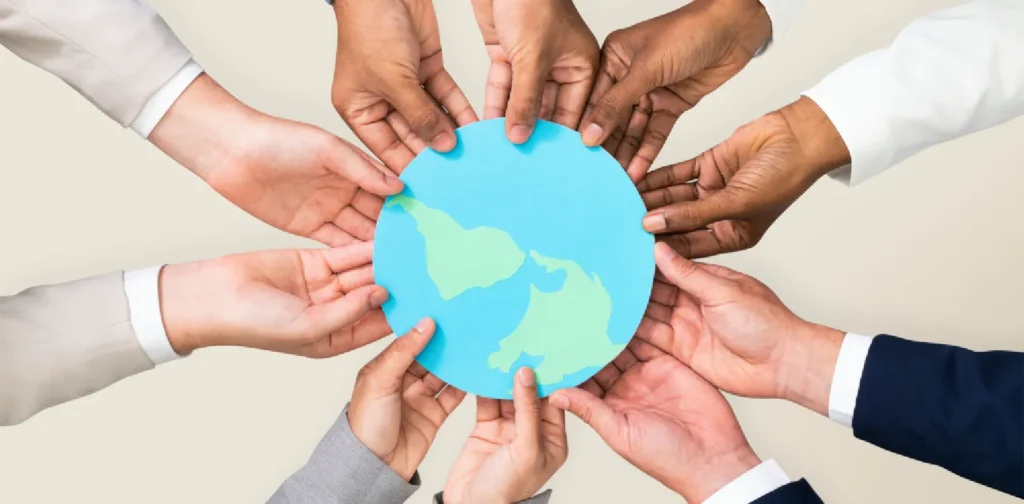 Hands with different skin colors holding earth illustration