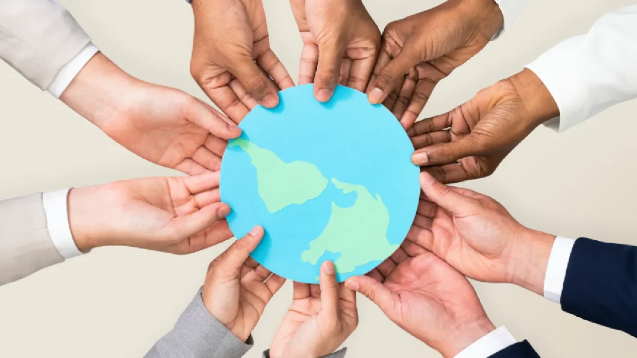 Hands with different skin colors holding earth illustration
