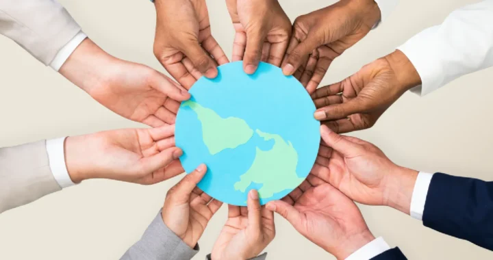 Hands with different skin colors holding earth illustration