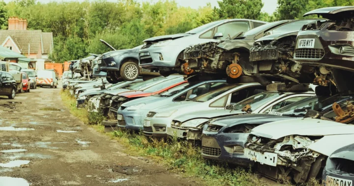 a bunch of old, unused cars in a lot
