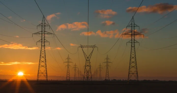 several power grids against a sunset sky