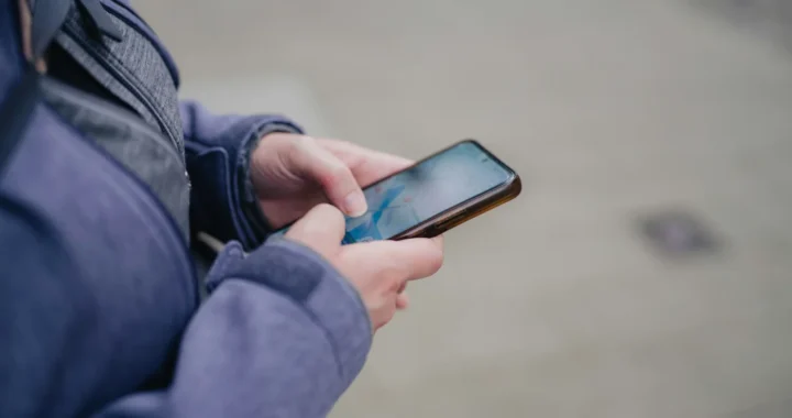 a person holding a smartphone