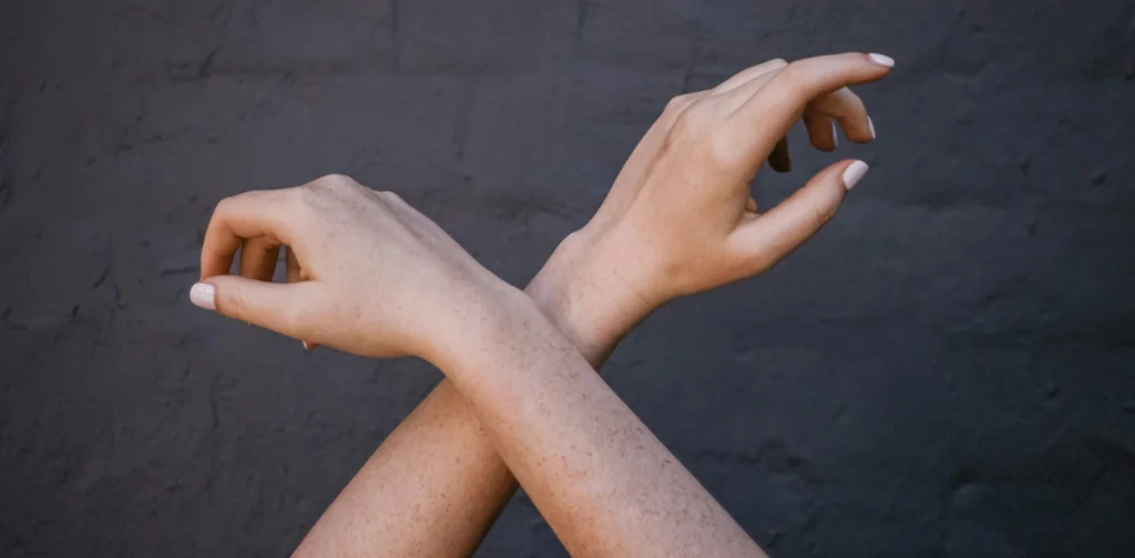 a pair of crossed arms