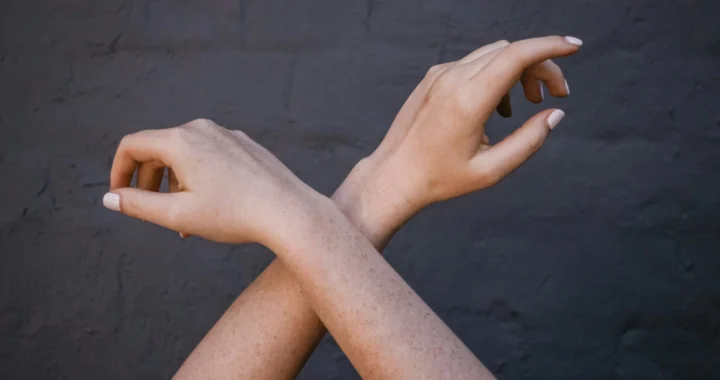 a pair of crossed arms