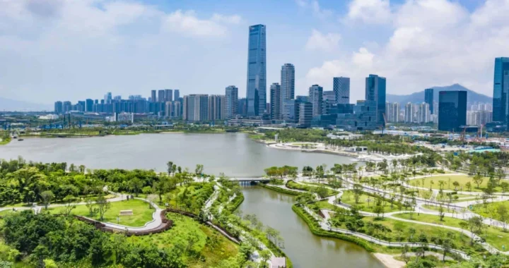 Aerial photo of an urban area with park, buildings, and waterways