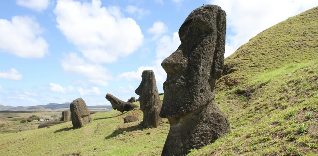 a sculpture in a green field