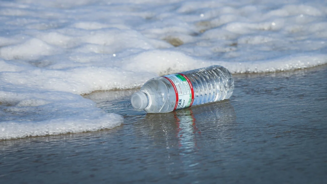 A plastic water bottle washed up on seashore