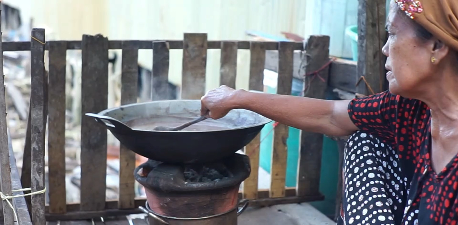 a woman stirring the pot