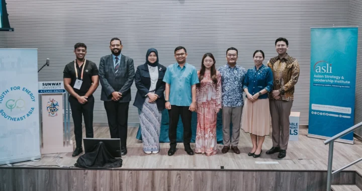 eight people standing on a podium
