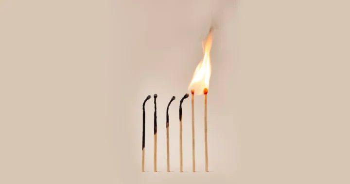 burning matches arranged side by side