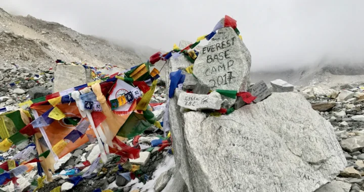 Flags and litters at the base camp of the Mount Everest
