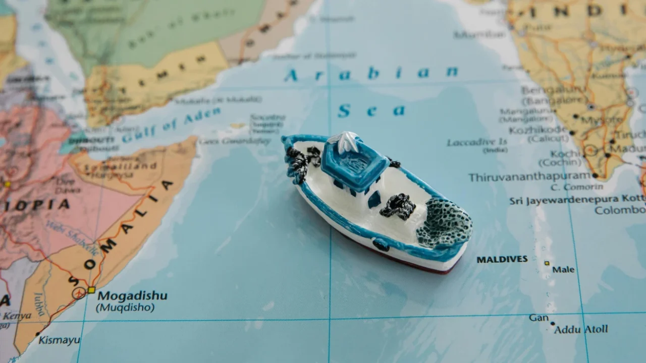 toy ship on a paper map