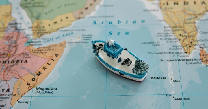 toy ship on a paper map