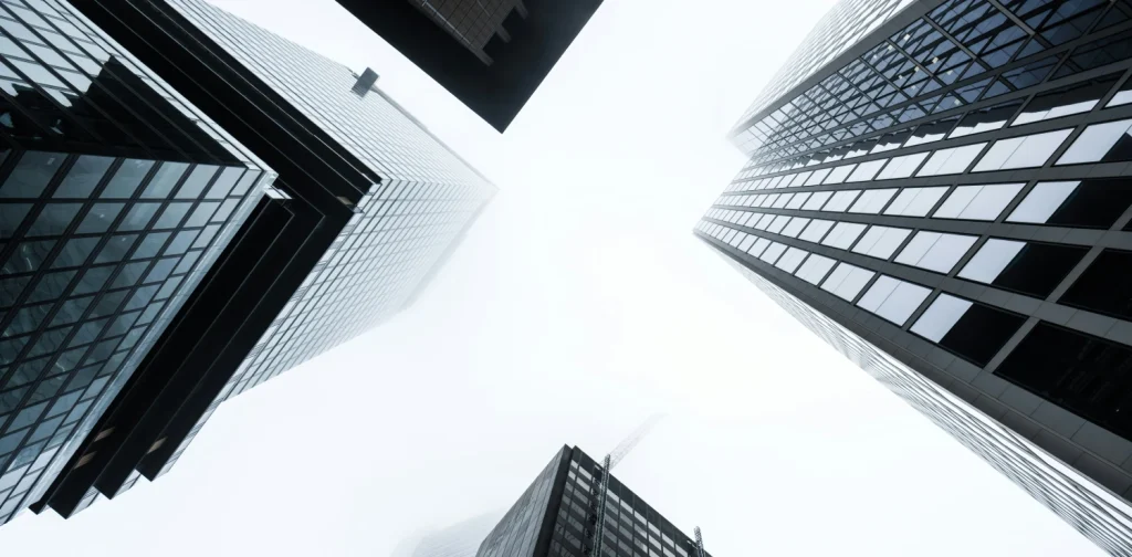 a low angle photo of skyscraper buildings