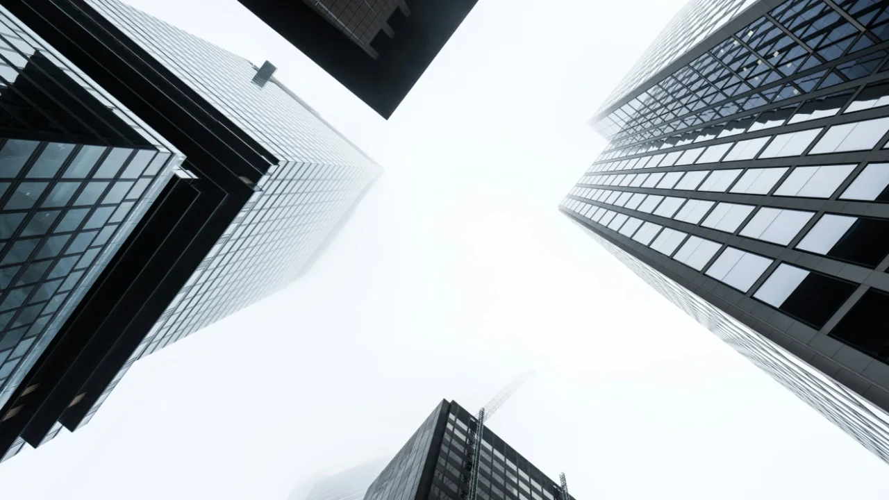 a low angle photo of skyscraper buildings