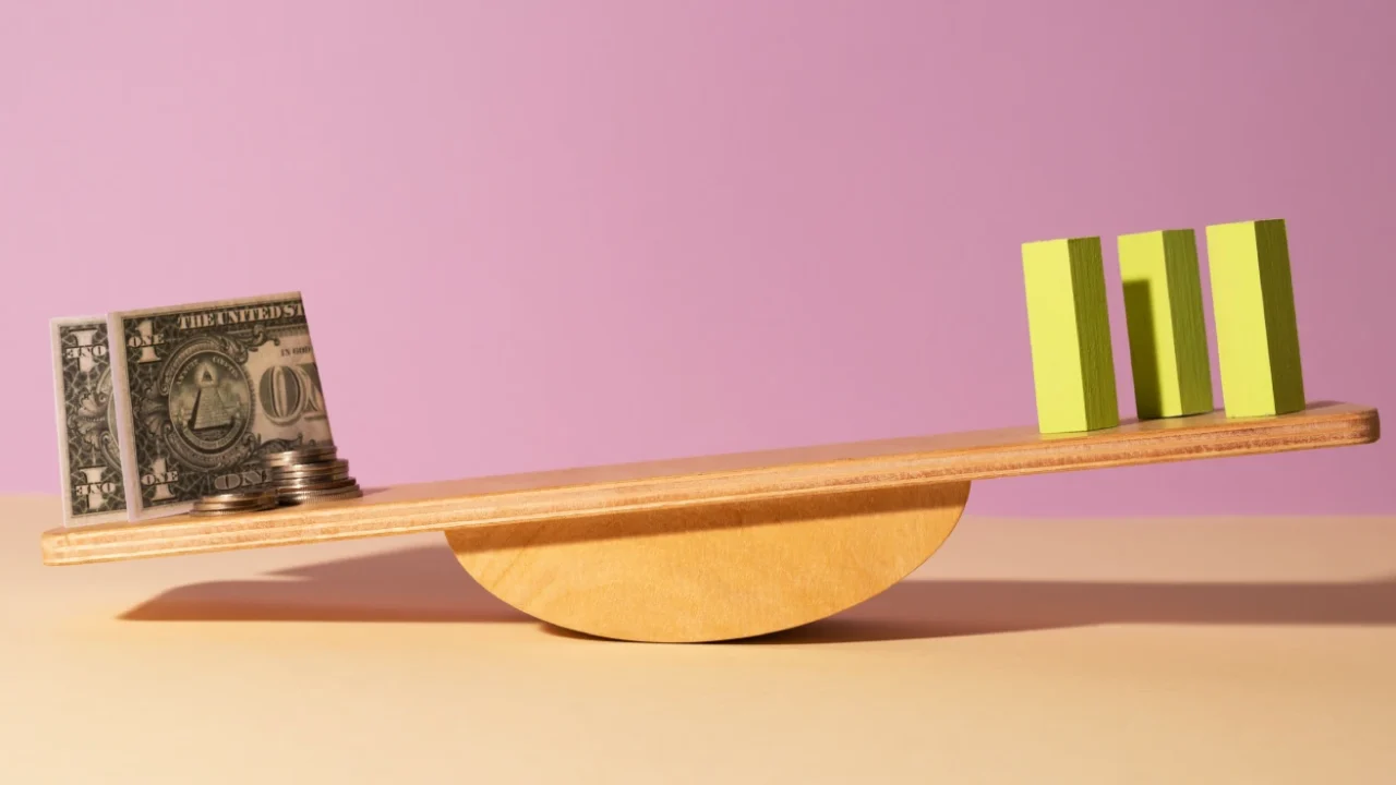 a still life of a seesaw tilting to the left