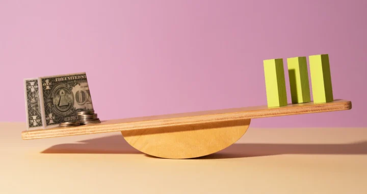 a still life of a seesaw tilting to the left
