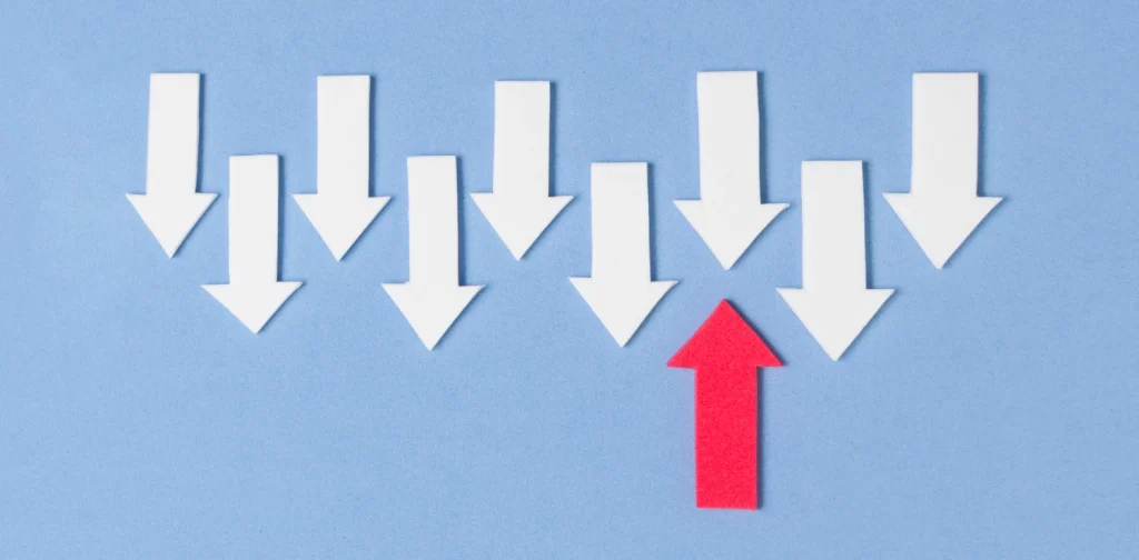 one red up arrow and 9 down arrows