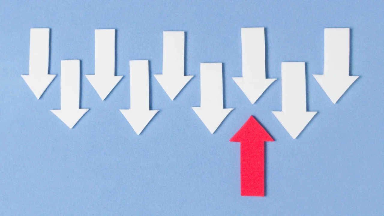 one red up arrow and 9 down arrows