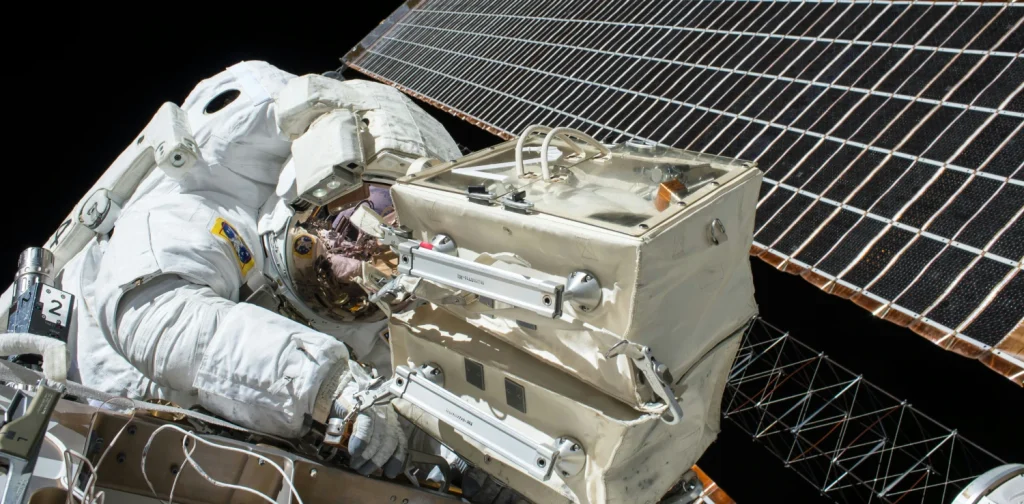 An astronaut in space outside their ship