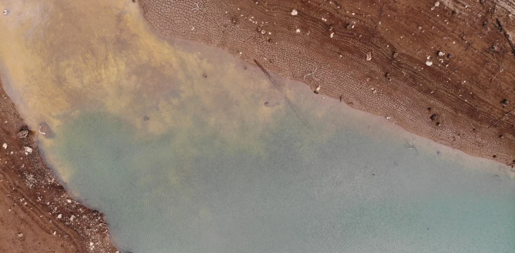 an aerial photo of a water reservoir