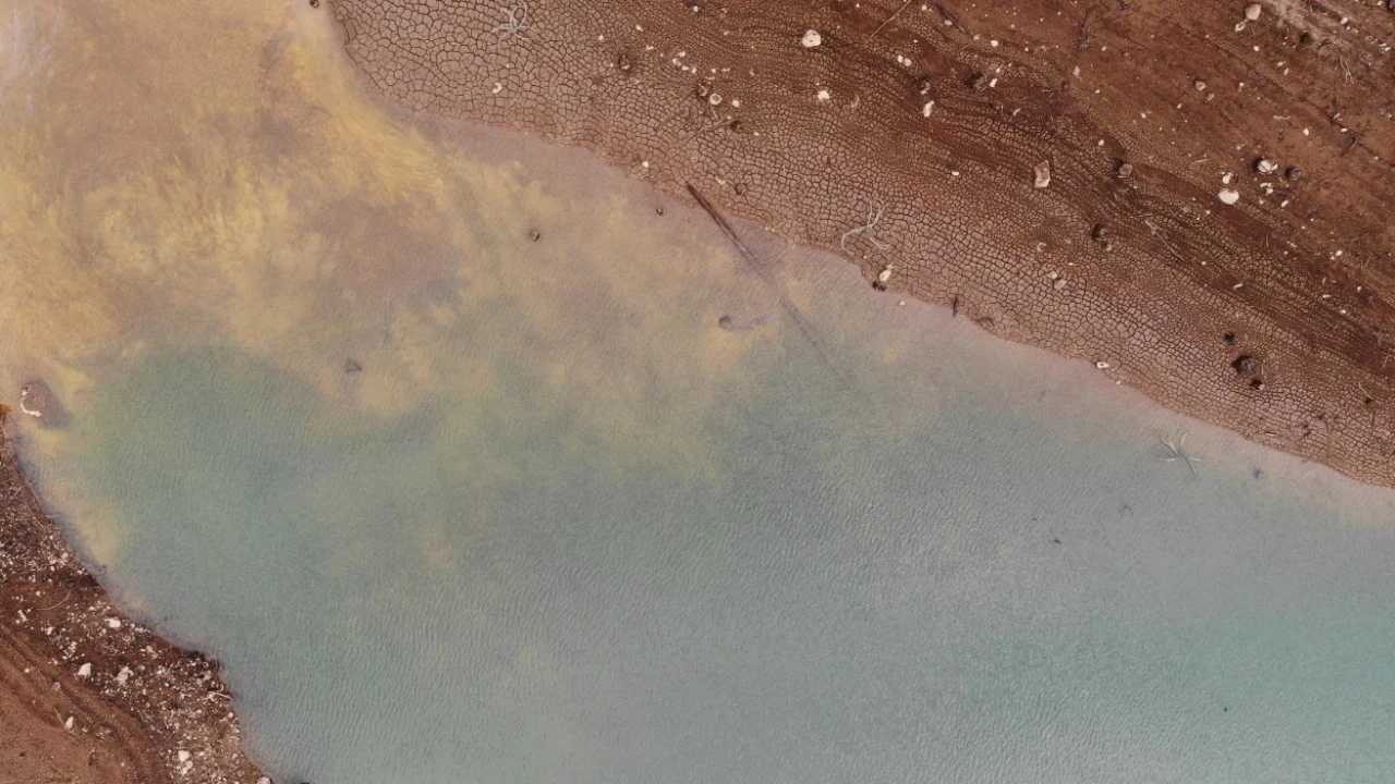 an aerial photo of a water reservoir