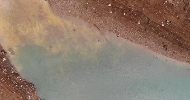 an aerial photo of a water reservoir